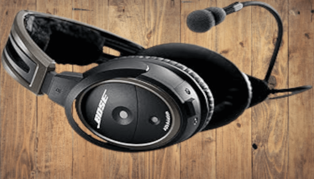 Best Helicopter Headsets for Pilots: Top Features, Noise Reduction, and Price Comparison 14 A Bose A30 helicopter pilot headset isolated on a white background, showing the noise-canceling earcups and microphone, essential for pilot communication and hearing protection.